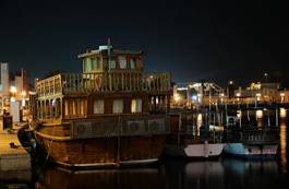 Obraz na płótnie woda statek arabski noc łódź