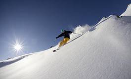 Naklejka słońce śnieg austria góra sporty zimowe