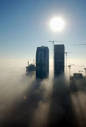 Fotoroleta niebo słońce dubaj budynek mgła