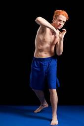 Fotoroleta sztuki walki ruch fitness lekkoatletka mężczyzna