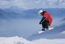 Obraz na płótnie snowboard słońce zabawa góra śnieg