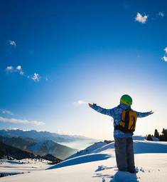 Fototapeta niebo kobieta słońce snowboarder