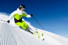 Obraz na płótnie zabawa narciarz piękny śnieg niebo