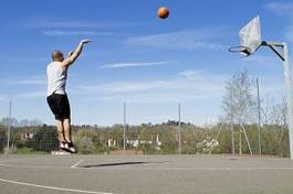 Obraz na płótnie koszykówka sport mężczyzna niebo piłka