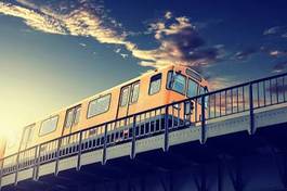 Obraz na płótnie słońce tramwaj most miasto