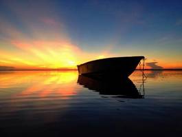 Naklejka łódź plaża sundown wschody