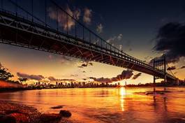 Plakat zachód słońca nad mostem tiboro w nowym jorku