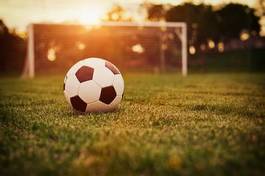 Obraz na płótnie trawa niebo piłka retro sport