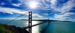 Fotoroleta most błękitne niebo woda wzgórze słońce