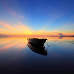 Obraz na płótnie błękitne niebo łódź pejzaż