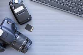 Fotoroleta fotograf tło karta pamięci laptop praca