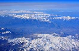 Fotoroleta krajobraz niebo góra samolot