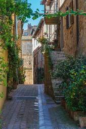 Naklejka piękne kolorowe ulice w słonecznej toskanii