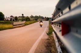 Fotoroleta niebo hantle motocyklista lekkoatletka