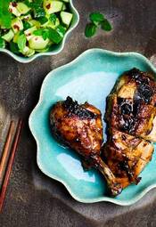 Fototapeta the chicken baked in asian style and cucumber salad