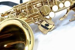 Naklejka orkiestra muzyka złoto saksofon