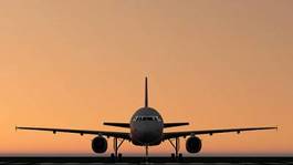 Obraz na płótnie samolot transport słońce odrzutowiec sylwetka