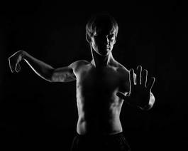 Fototapeta the lessons of self-defense. martial arts.