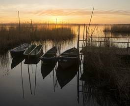 Fototapeta słońce łódź woda most molo