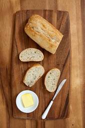 Fototapeta jedzenie kromka masło zakwas chlebowy nóż