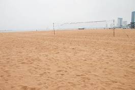 Obraz na płótnie słońce plaża siatkówka piłka