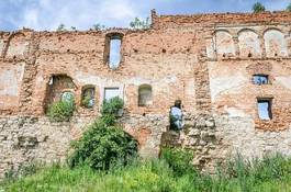 Naklejka the collapsed ruins of the old castle walls near lviv in ukraine
