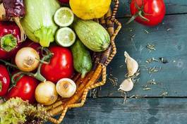Fotoroleta assortment of fresh vegetables on wooden background