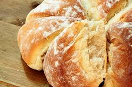 Fototapeta bread.
fresh homemade loaf of bread on wooden background.