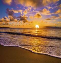 Obraz na płótnie zachód słońca na plaży