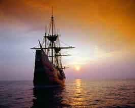 Obraz na płótnie statek przy zachodzie słońca