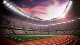 Plakat oświetlony stadion piłkarski