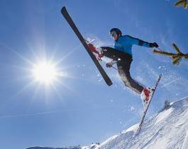 Plakat słońce sporty zimowe alpy ruch