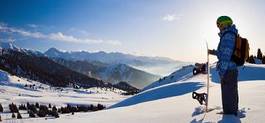 Naklejka słońce snowboard alpy kobieta góra