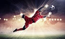 Obraz na płótnie mężczyzna sport pole piłka nożna niebo