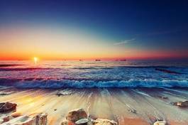Plakat wschód słońca nad morzem