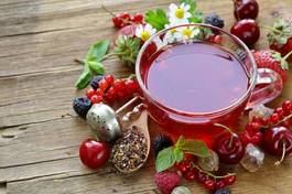 Naklejka berry tea with fresh currants, raspberries and strawberries