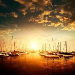 Obraz na płótnie jachty i zachód słońca