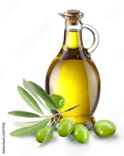 Fototapeta Gałązka oliwek z butelką oliwy