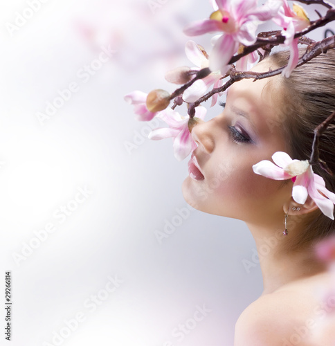 Obraz na płótnie kobieta magnolia twarz dziewczynka zdrowie