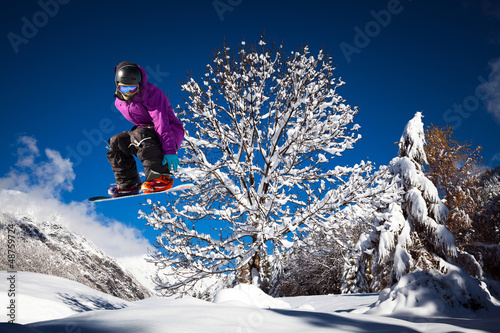 Naklejka sporty ekstremalne snowboarder niebo