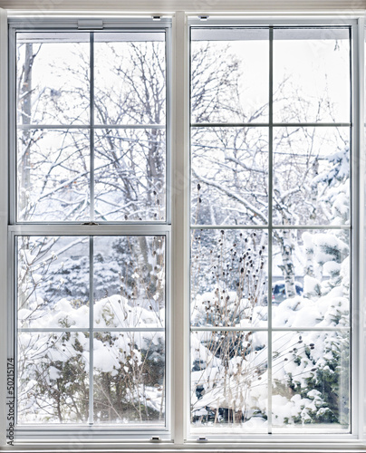 Obraz na płótnie Urok zimy za oknem