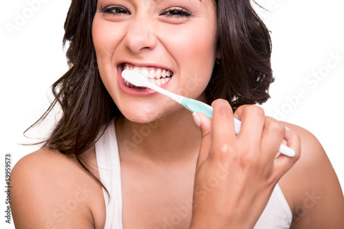 Fototapeta Kobieta szczotkująca zęby