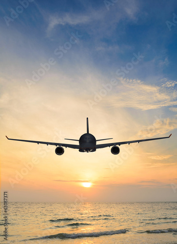 Fotoroleta słońce tropikalny zmierzch woda samolot