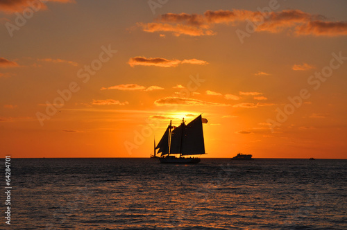Fototapeta słońce łódź statek