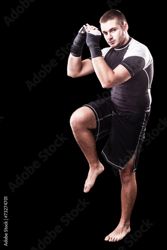 Fototapeta lekkoatletka kick-boxing ćwiczenie