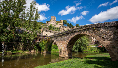 Obraz na płótnie most zamek wioska rycerz rzeki