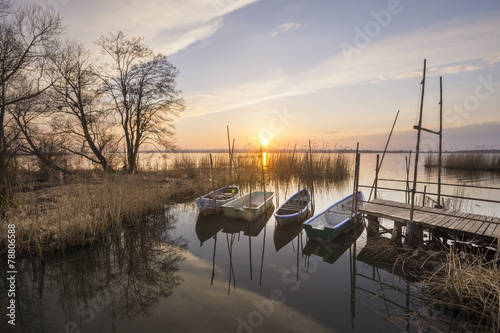 Obraz na płótnie woda łódź jezioro słońce most
