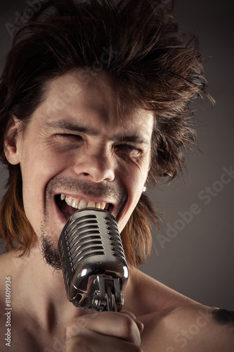 Fotoroleta mężczyzna muzyka koncert przystojny mikrofon