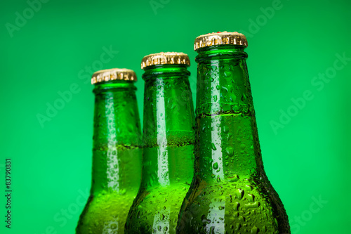 Obraz na płótnie Three wet blank beer bottles