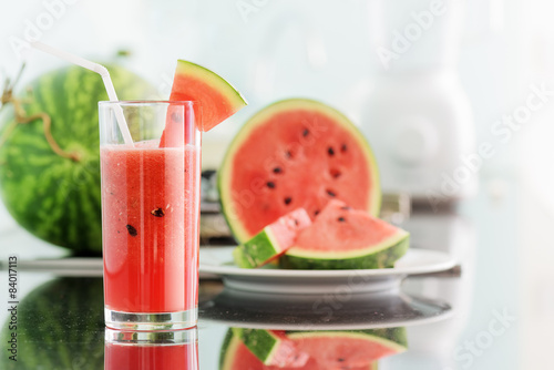 Fototapeta Glass of fresh watermelon juice on kitchen table